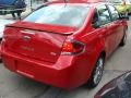 2010 Sangria Red Metallic Ford Focus SES Sedan  photo #4