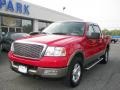 2004 Bright Red Ford F150 Lariat SuperCrew 4x4  photo #1