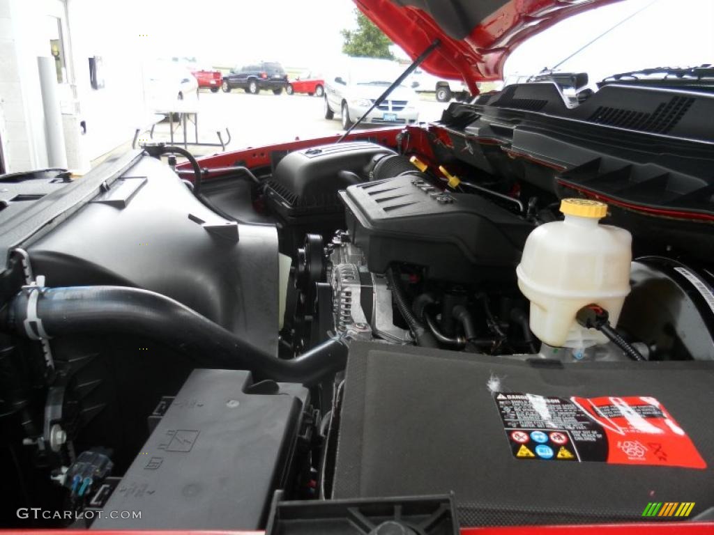 2011 Ram 1500 ST Quad Cab 4x4 - Flame Red / Dark Slate Gray/Medium Graystone photo #19