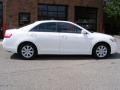 2009 Super White Toyota Camry XLE  photo #2