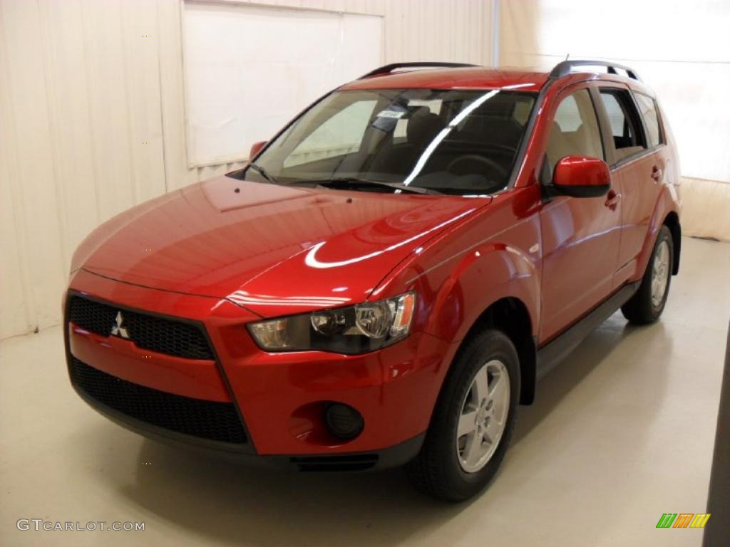 2010 Outlander ES - Rally Red Metallic / Black photo #1