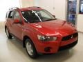 2010 Rally Red Metallic Mitsubishi Outlander ES  photo #5