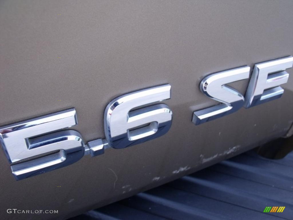 2004 Titan SE King Cab 4x4 - Copper / Sand/Steel photo #17