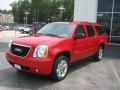 2011 Victory Red GMC Yukon XL SLT  photo #1