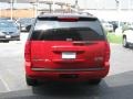 2011 Victory Red GMC Yukon XL SLT  photo #4