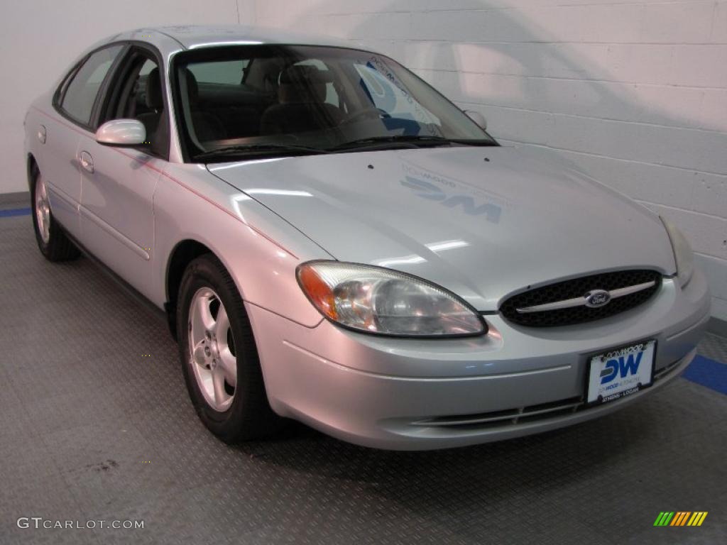 Silver Frost Metallic Ford Taurus