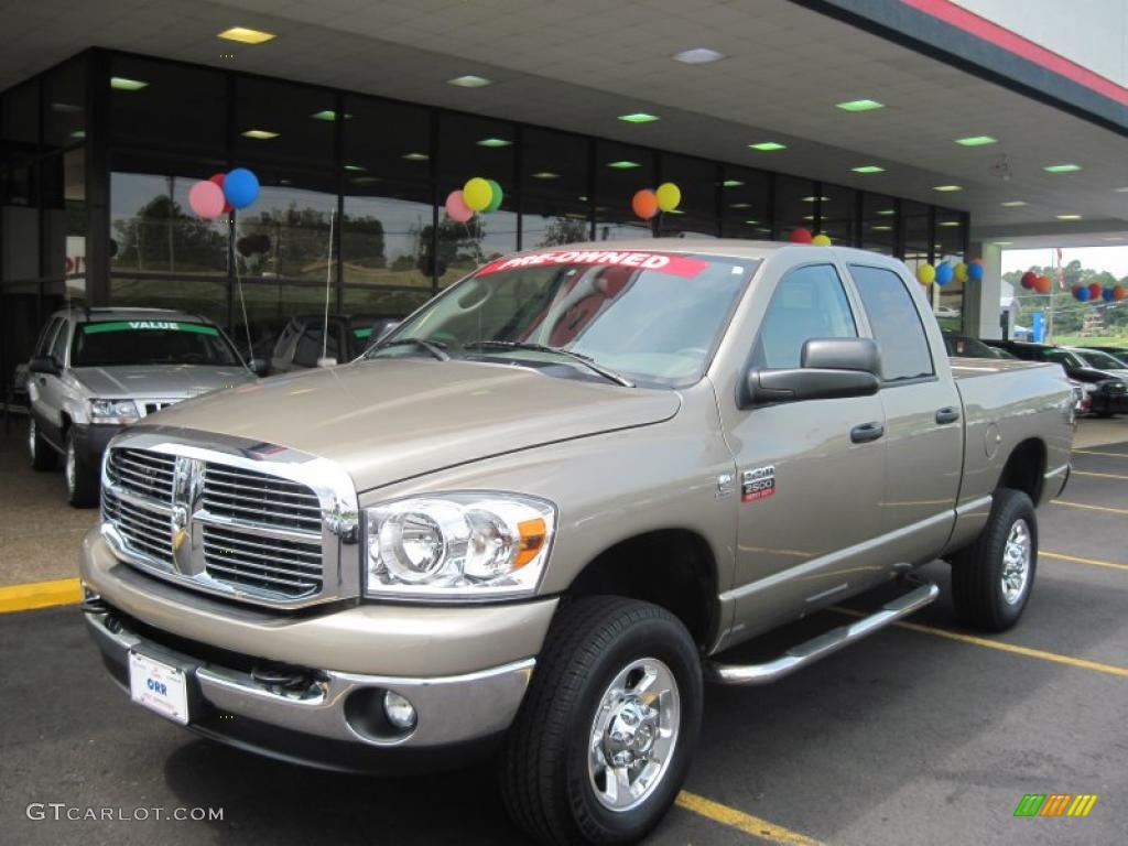 2009 Ram 2500 Lone Star Quad Cab 4x4 - Light Khaki Metallic / Khaki photo #1