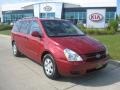 2009 Claret Red Kia Sedona LX  photo #1