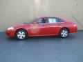 2010 Victory Red Chevrolet Impala LS  photo #1