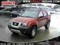 2010 Red Brick Metallic Nissan Xterra X 4x4  photo #1