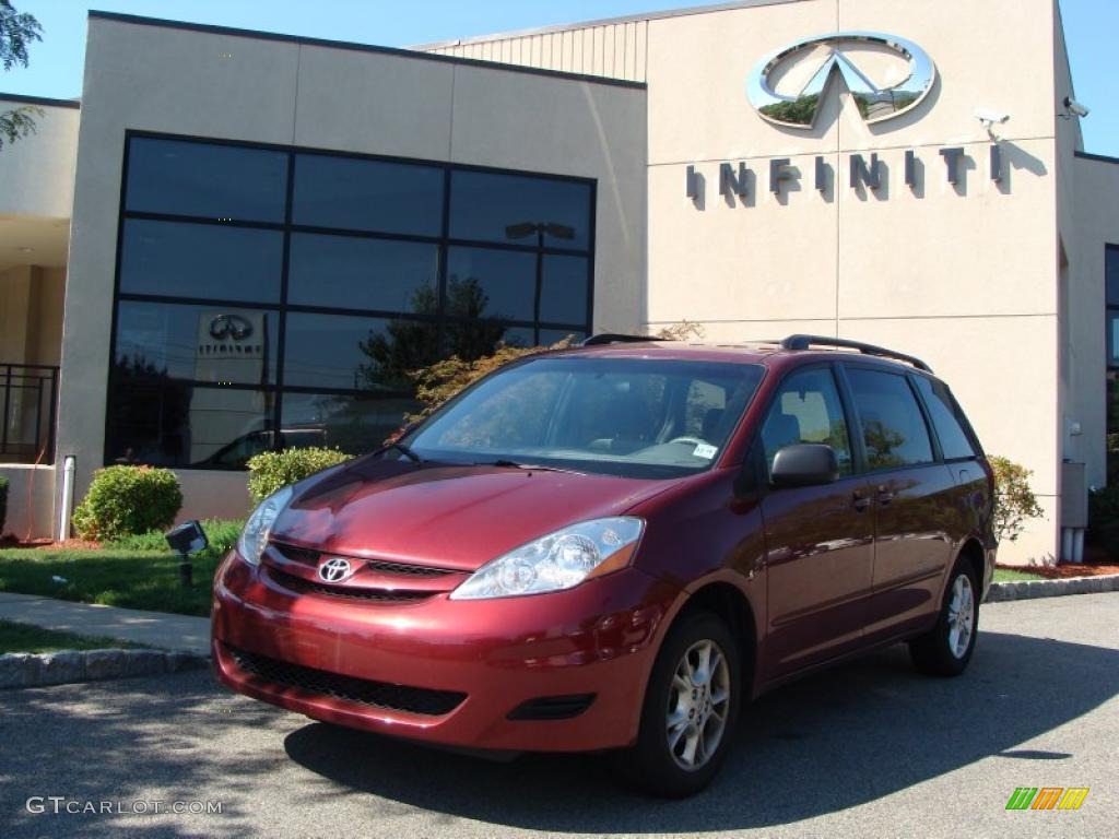 2006 Sienna LE AWD - Salsa Red Pearl / Stone Gray photo #1