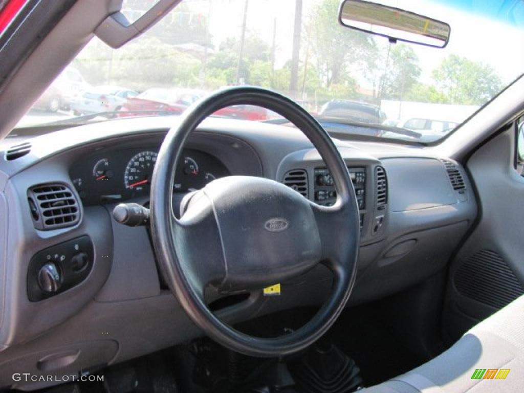 2002 F150 XL Regular Cab 4x4 - Bright Red / Medium Graphite photo #13