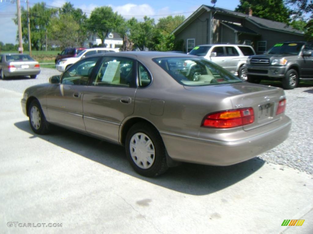 1999 Avalon XL - Sable Pearl / Ivory photo #5