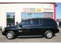 2004 Onyx Black GMC Envoy XL SLT 4x4  photo #15