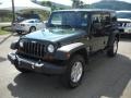 2010 Natural Green Pearl Jeep Wrangler Unlimited Sport 4x4  photo #16