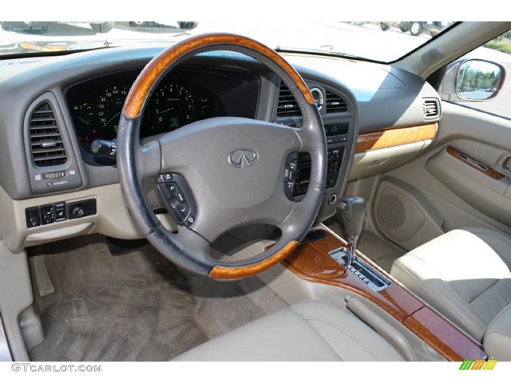 2002 QX4 4x4 - Bronze Metallic / Stone Beige photo #14