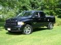 2004 Black Dodge Ram 1500 SLT Quad Cab 4x4  photo #1