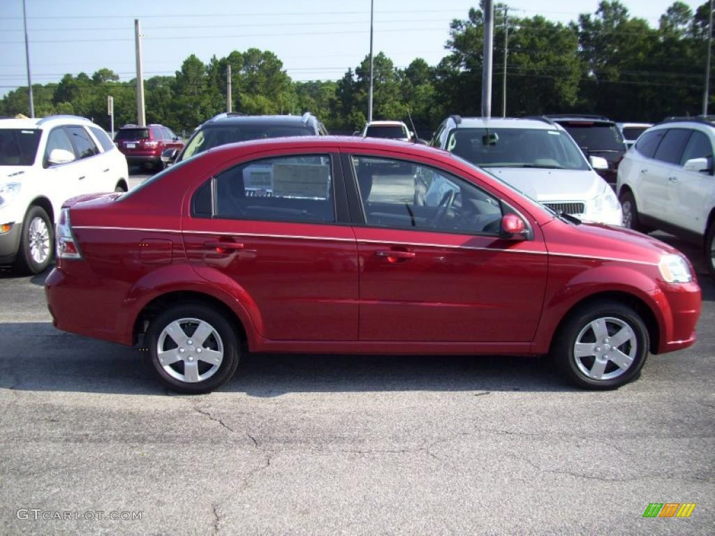 2010 Aveo LT Sedan - Sport Red / Charcoal photo #1