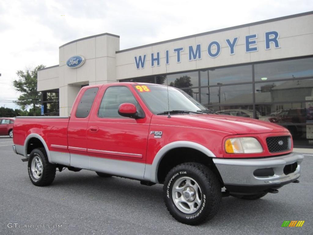 1998 F150 XLT SuperCab 4x4 - Bright Red / Medium Graphite photo #1