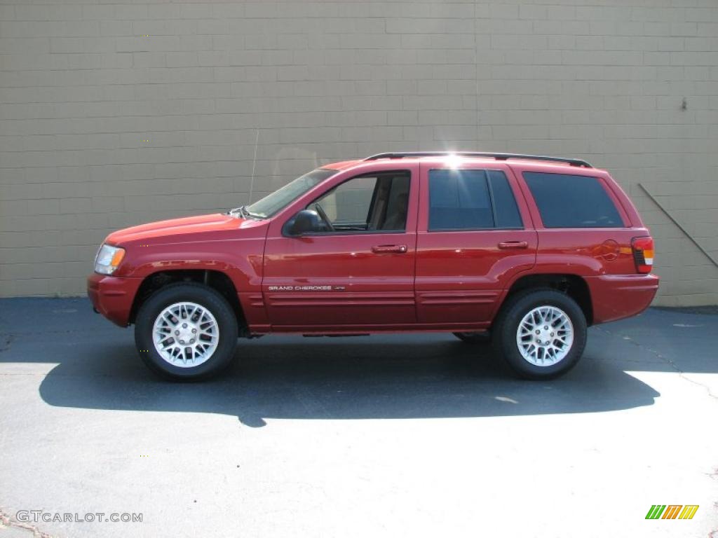 2002 Grand Cherokee Limited 4x4 - Inferno Red Tinted Pearlcoat / Sandstone photo #1