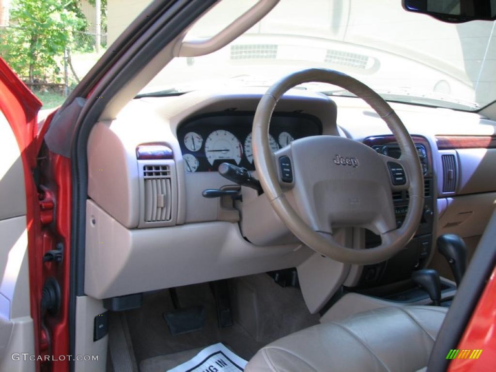 2002 Grand Cherokee Limited 4x4 - Inferno Red Tinted Pearlcoat / Sandstone photo #14