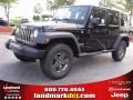 2010 Black Jeep Wrangler Unlimited Mountain Edition 4x4  photo #1