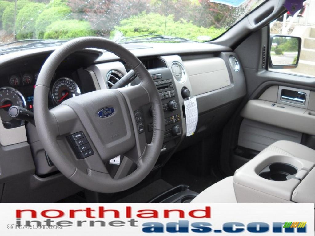 2010 F150 XLT SuperCrew 4x4 - Dark Blue Pearl Metallic / Medium Stone photo #10