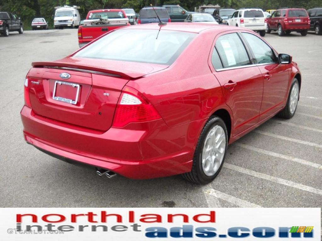 2011 Fusion SE - Red Candy Metallic / Charcoal Black photo #6