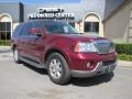 2004 Merlot Red Metallic Lincoln Navigator Luxury  photo #1