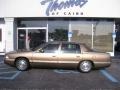 1998 Gold Fire Mist Metallic Cadillac DeVille Sedan  photo #1