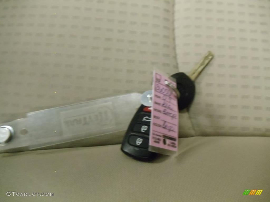 2009 Borrego LX V6 - Metal Bronze / Beige photo #26