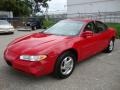 Bright Red - Grand Prix SE Sedan Photo No. 2