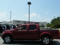 2006 Red Brawn Nissan Frontier LE Crew Cab  photo #2