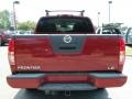 2006 Red Brawn Nissan Frontier LE Crew Cab  photo #4
