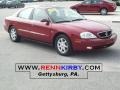 2003 Matador Red Metallic Mercury Sable LS Premium Sedan  photo #1