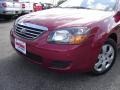 2009 Spicy Red Metallic Kia Spectra EX Sedan  photo #9