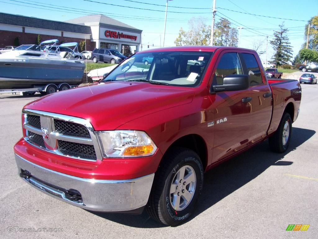 2009 Ram 1500 SLT Quad Cab 4x4 - Inferno Red Crystal Pearl / Dark Slate Gray photo #1