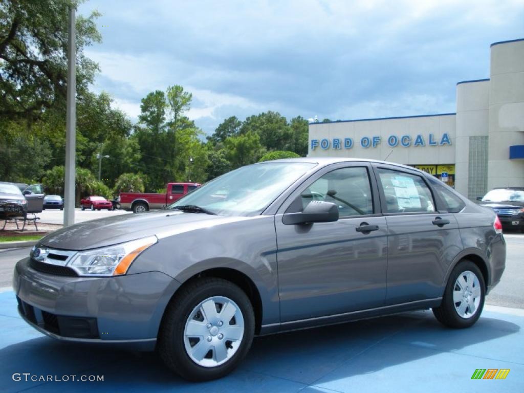 2010 Focus S Sedan - Sterling Grey Metallic / Medium Stone photo #1