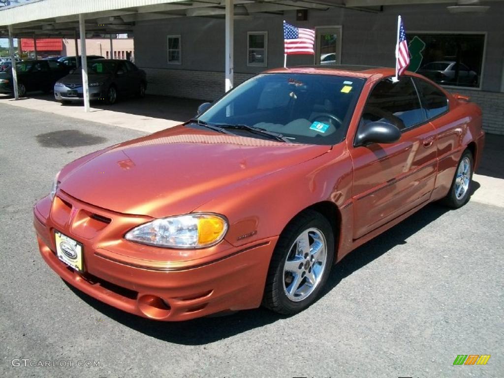 2004 Grand Am GT Coupe - Fusion Orange Metallic / Dark Pewter photo #1