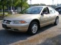 Champagne Beige Pearl 2000 Dodge Stratus SE