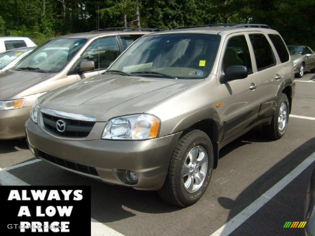 2001 Tribute LX V6 4WD - Parchment Gold Metallic / Beige photo #2
