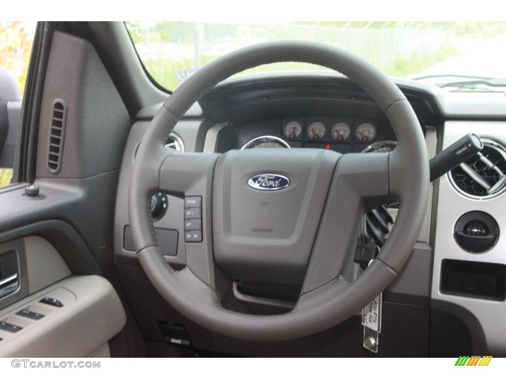 2010 F150 XLT SuperCrew - Tuxedo Black / Medium Stone photo #15