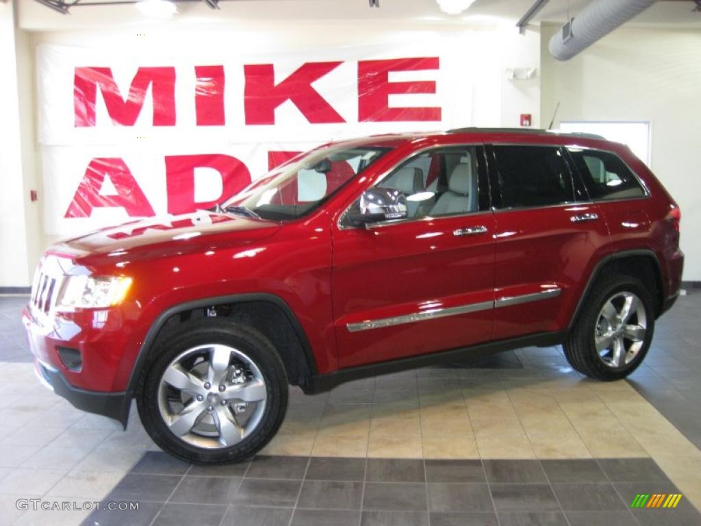 2011 Grand Cherokee Overland - Inferno Red Crystal Pearl / Dark Frost Beige/Light Frost Beige photo #1