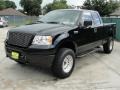 2005 Black Ford F150 STX SuperCab 4x4  photo #7