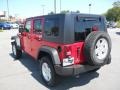 2010 Flame Red Jeep Wrangler Unlimited Sport 4x4  photo #2