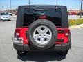 2010 Flame Red Jeep Wrangler Unlimited Sport 4x4  photo #3