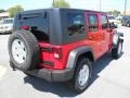 2010 Flame Red Jeep Wrangler Unlimited Sport 4x4  photo #4