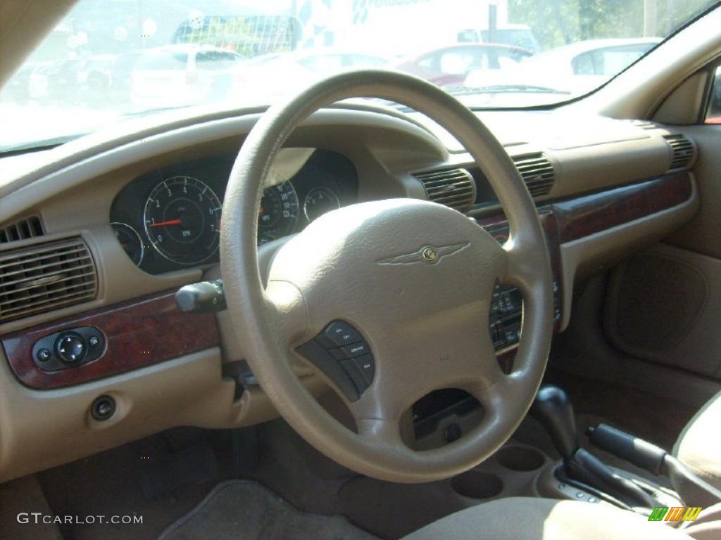 2002 Sebring LX Sedan - Ruby Red Pearl / Sandstone photo #11