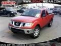 2010 Red Alert Nissan Frontier SE V6 King Cab 4x4  photo #1