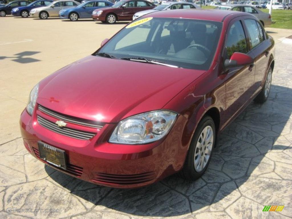 2009 Cobalt LT Sedan - Rally Yellow / Ebony photo #1